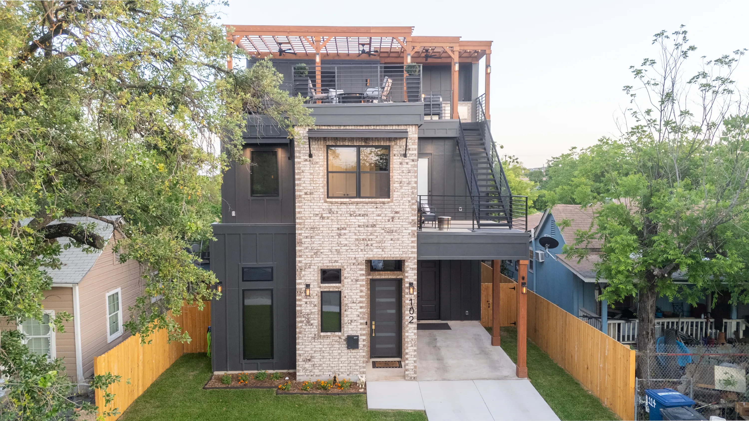 Exterior of a completed Ella Bree custom home at twilight in San Antonio.